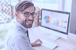 an employee who is doing well after he helped to solve his company's cybersecurity threats with the help of a trusted IT support partner