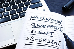 a list of passwords on a piece of paper showing how complex passwords must be