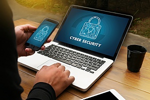 a business owner purchasing cybersecurity insurance