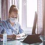 a woman performing remote work during the COVID-19 outbreak