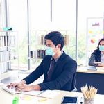 Employees returning to office in mask