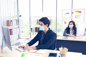 Employees returning to office in mask