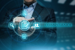 compliance requirements being looked up but small business owner