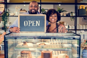 small business owners opening their shop