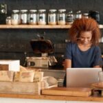 women working in her small business cafe