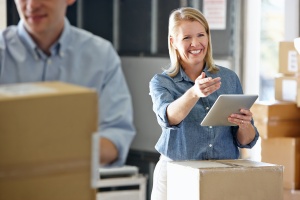 women small business owner welcoming customers