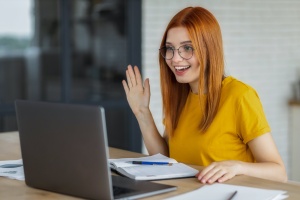 women in meeting while being online 