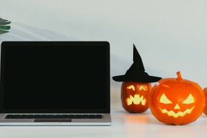 laptop with halloween pumpkins. 3D render