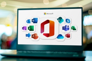 Laptop computer displaying logos of Microsoft Office