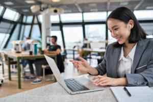 women in office at her Hybrid Work Model